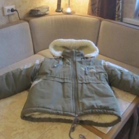 Зимняя куртка на искусственном меху, размер 122. Б/у, состояние хорошее. куртка очень легкая.