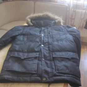 Мужская зимняя  куртка  фирмы  O Stin, размер 48-50. Мех у капюшона натуральный.