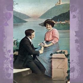 Антикварная открытка "Парочка на набережной реки"